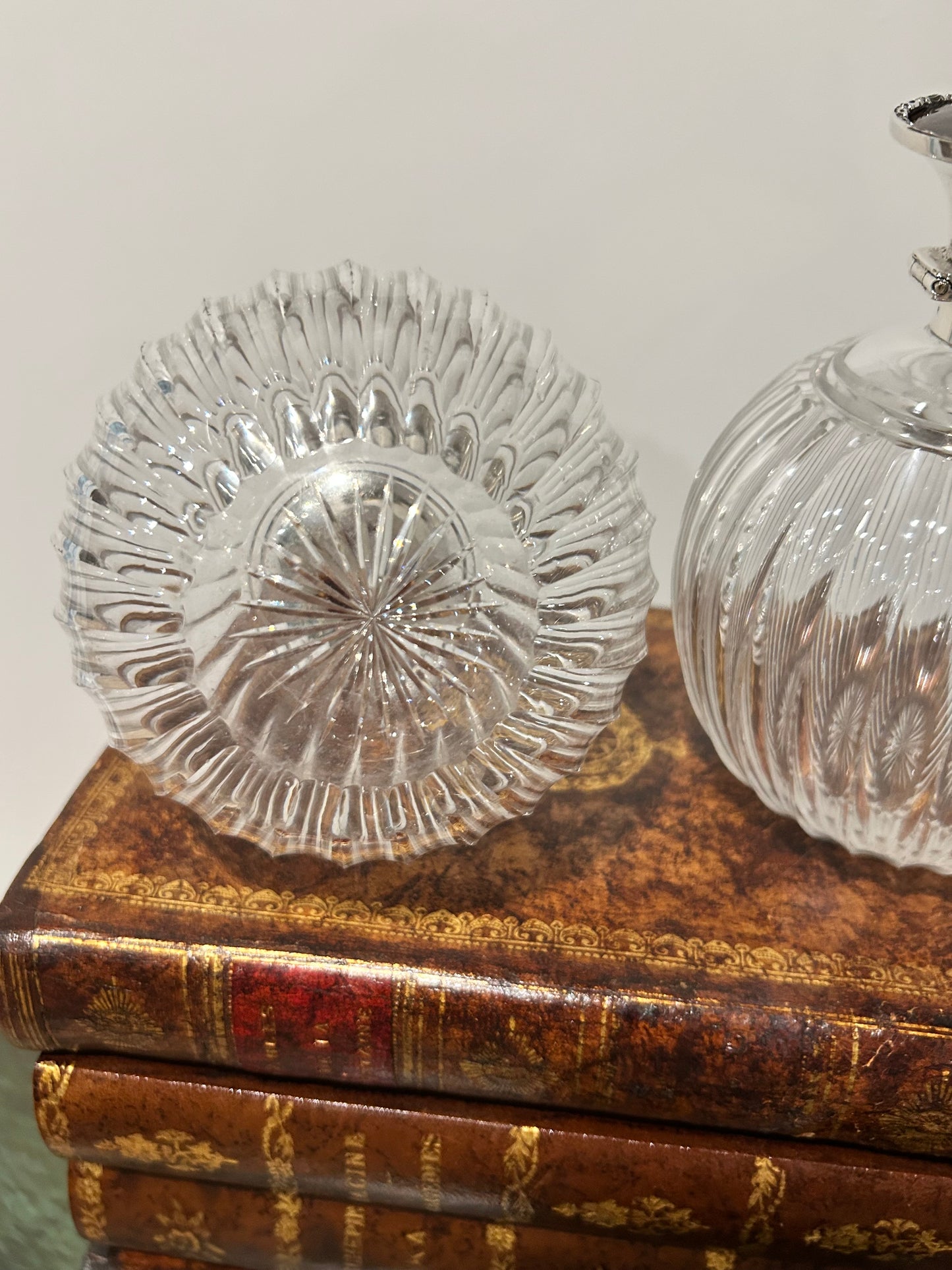 Pair of antique perfume bottles with tortoiseshell & sterling silver caps