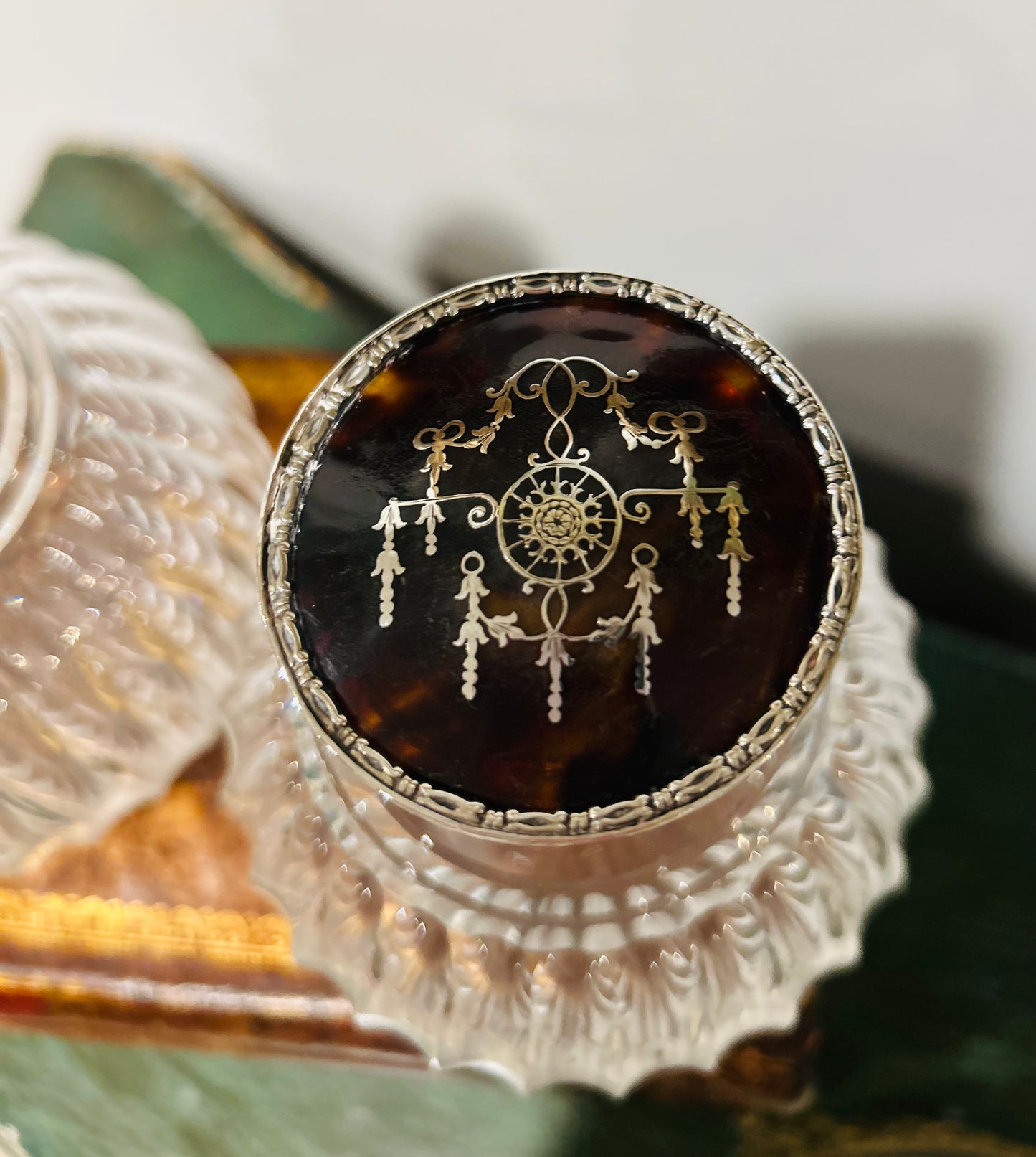 Pair of antique perfume bottles with tortoiseshell & sterling silver caps